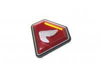 Image of Side panel Honda wing emblem on red background, Left hand