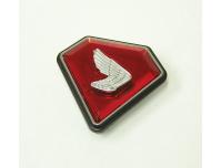 Image of Side panel Honda wing emblem on red background, Right hand